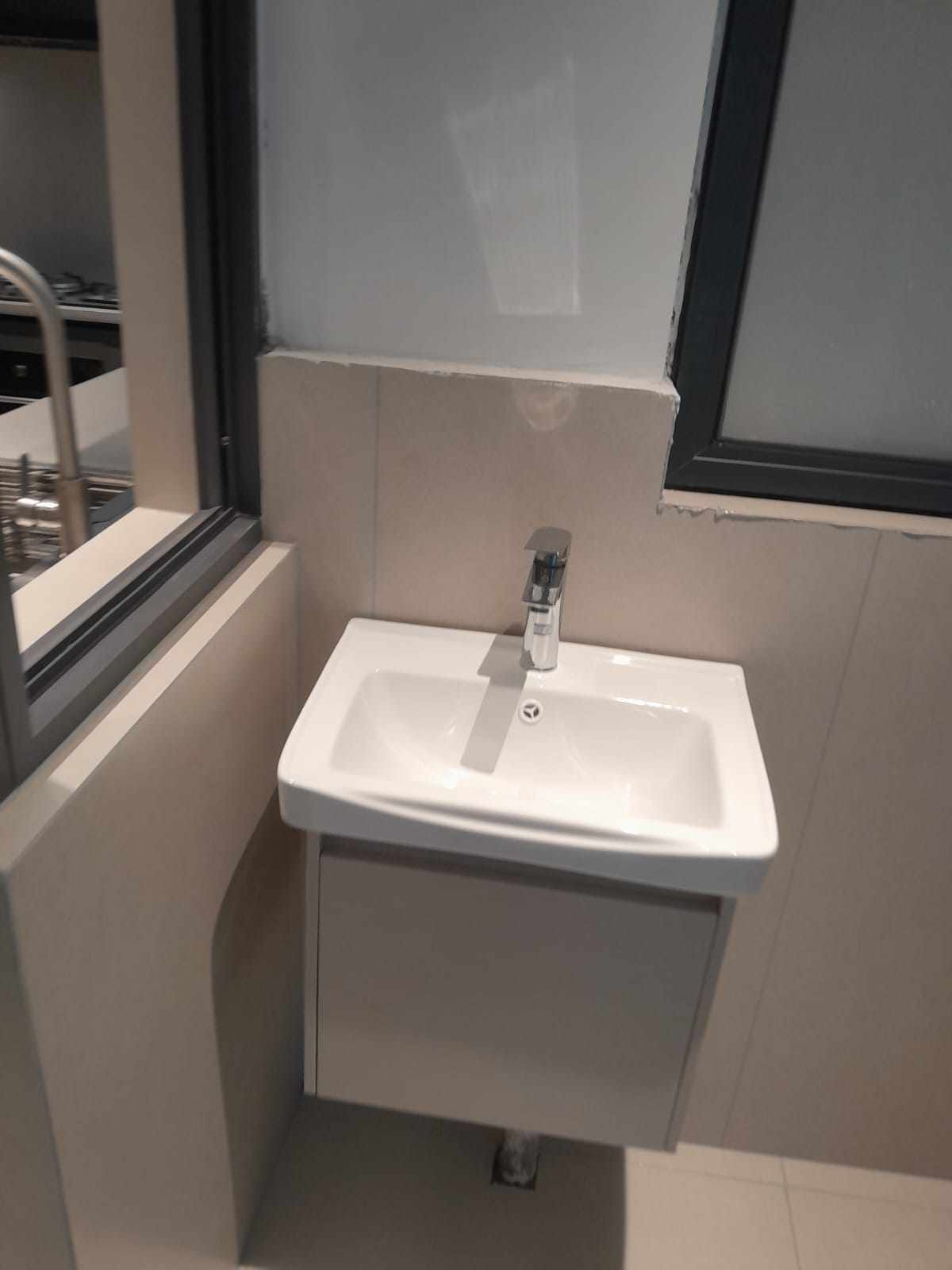 Wall-Mounted Sink Installation — after